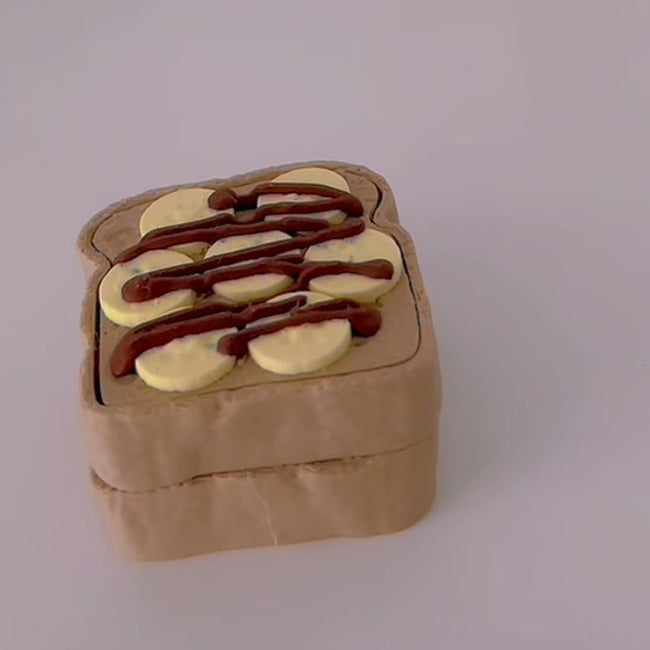 Banana Toast Clicker photographed in lovely day studio