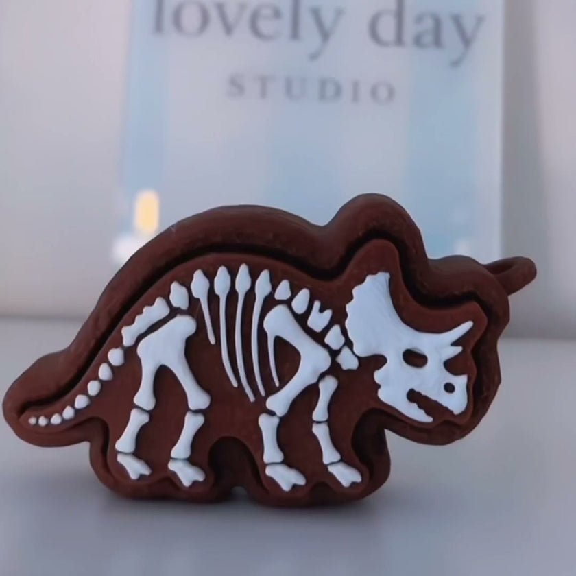 Dino Cookie Clicker photographed in lovely day studio