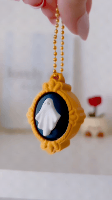 Ghost in Gold Frame Clicker Keychain